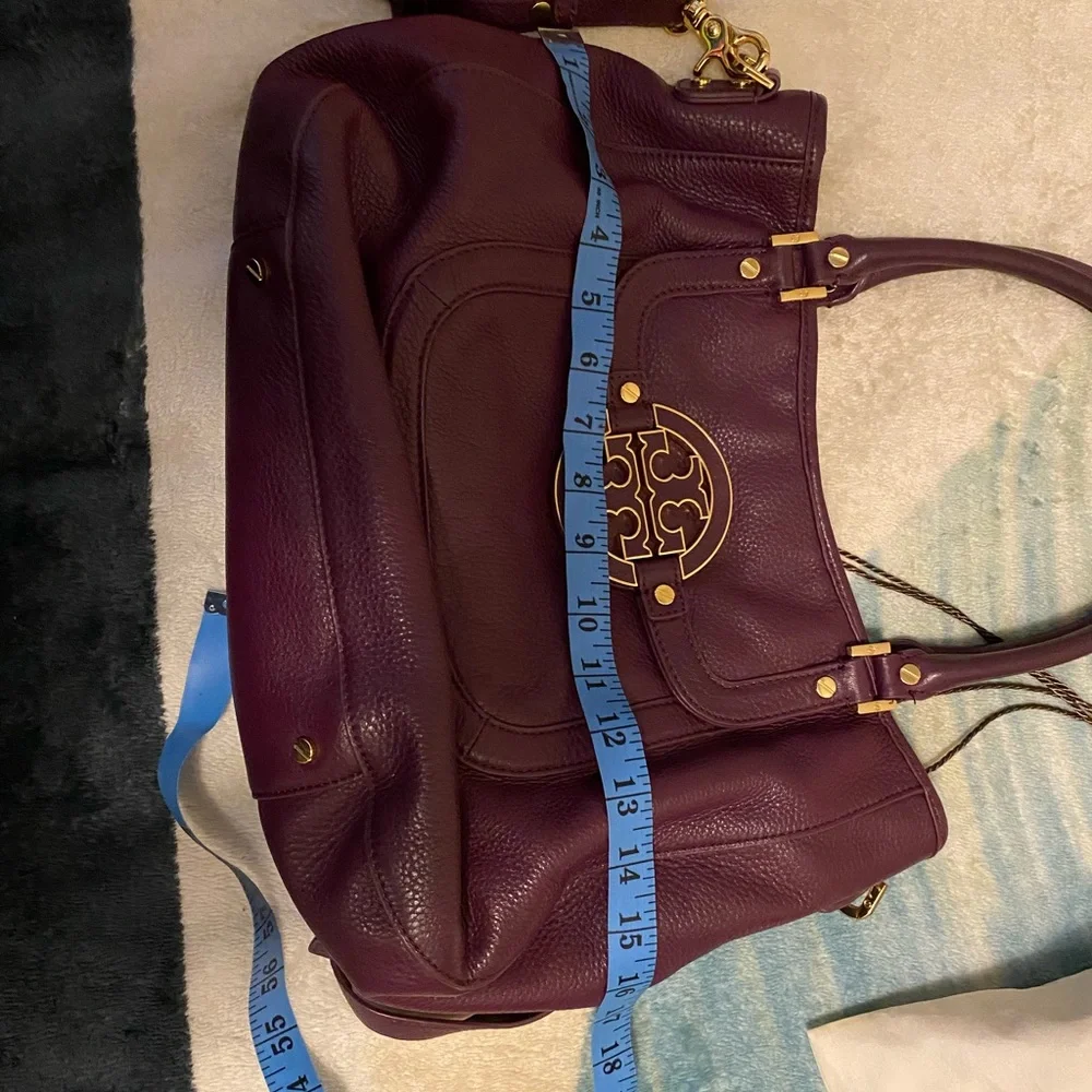 Tory Burch purple bag.